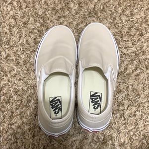 Cream slip on vans